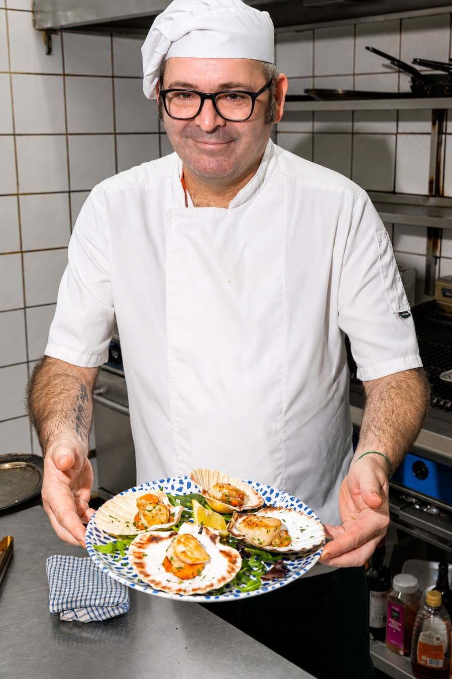 Chef Antonio with pan-fried king scallops